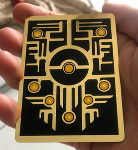 Back side of the Ancient Mewtwo gold metal custom Pokemon card