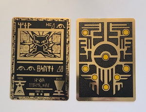 Ancient Mew Pokemon Card. Gold and black metal Pokemon card. Pictures show front and back of the card.